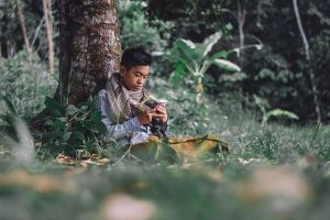 man reading Koran